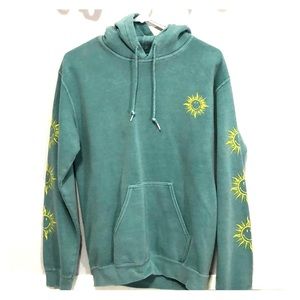 Woman’s teal hoodie